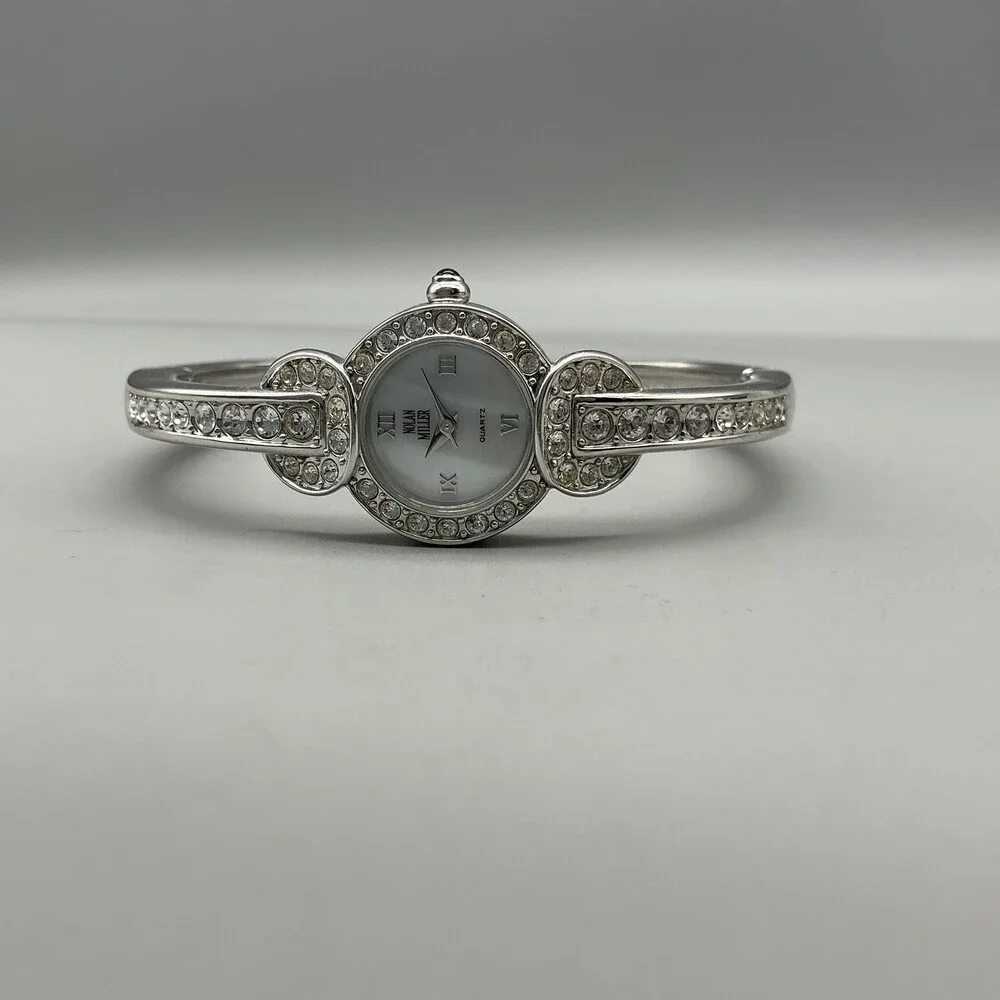 Nolan Miller Womens Watch 21mm Silver Tone MOP Dial Bangle Crystals 7